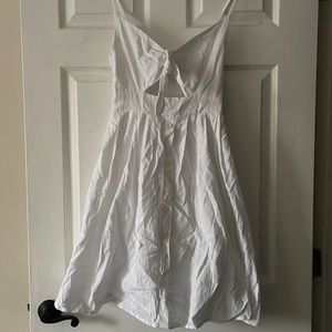 White dress with buttons down the middle